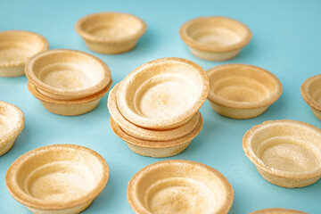 Homemade tartlets on blue background