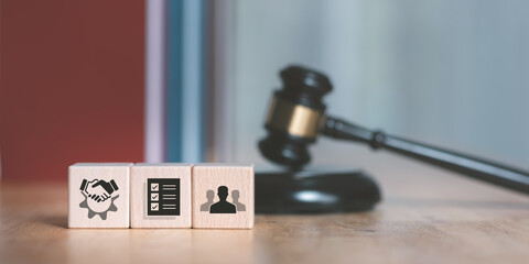 Wooden judge gavel on table ,justice in punishment of offenses and criminal verdicts ,concept of law and justice ,court proceedings ,planning for court proceedings ,legal contract consulting