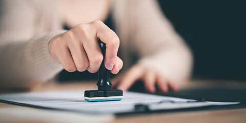 business woman validates and manages business documents and agreements,legal contract,signing...