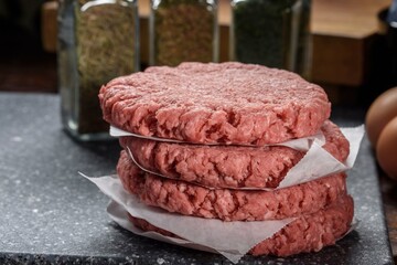 Art of Preparation: Close-Up of Raw Hamburger Patty on a Wooden Board, Ready to be Seasoned, Showcasing the Essence of Culinary Craftsmanship in 4K Resolution