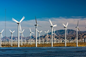 Renewable Symphony: Wind Turbine Farm and Solar Panels in the Vibrant Southern California...