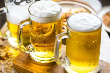 Refreshing Pour: Close-Up of Pouring and Serving Cold Beer into a Glass, Showcased in Crisp 4K Resolution