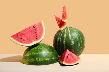 Fresh watermelons on beige table