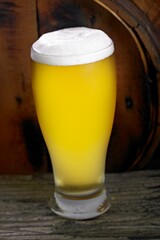 Refreshing Pour: Close-Up of Pouring and Serving Cold Beer into a Glass, Showcased in Crisp 4K Resolution