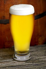 Refreshing Pour: Close-Up of Pouring and Serving Cold Beer into a Glass, Showcased in Crisp 4K Resolution