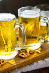 Refreshing Pour: Close-Up of Pouring and Serving Cold Beer into a Glass, Showcased in Crisp 4K Resolution