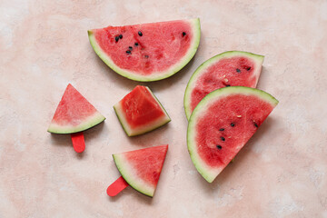 Pieces of fresh watermelon on pink background