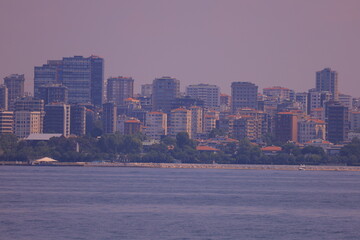 Panorama silhouette Istanbul city buildings from water Bosphorus, a public place	
