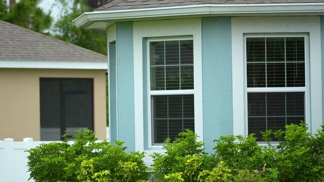 Single family home in southern USA. Generic american private house in southwest Florida with large kitchen windows