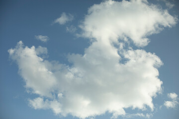 Cloud in sky. White clouds in summer. Blue sky.