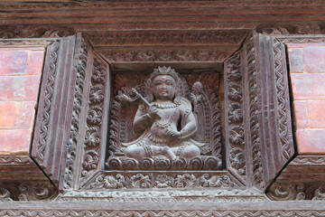 Fragment of wooden decorations on a building in Bhaktapur, Nepal.