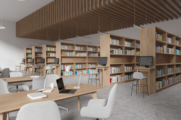 Modern library interior with table and chairs in row, pc computer and shelf