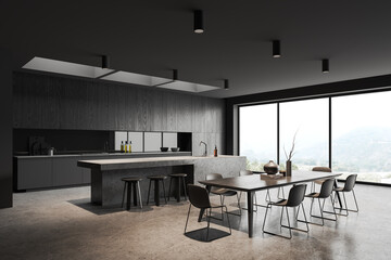 Gray kitchen corner with island and dining table