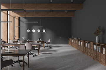 Gray and wooden coworking office interior with clocks