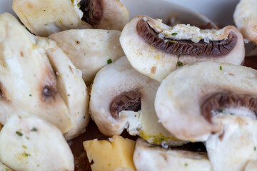 sliced mushrooms while cooking dishes with champignons