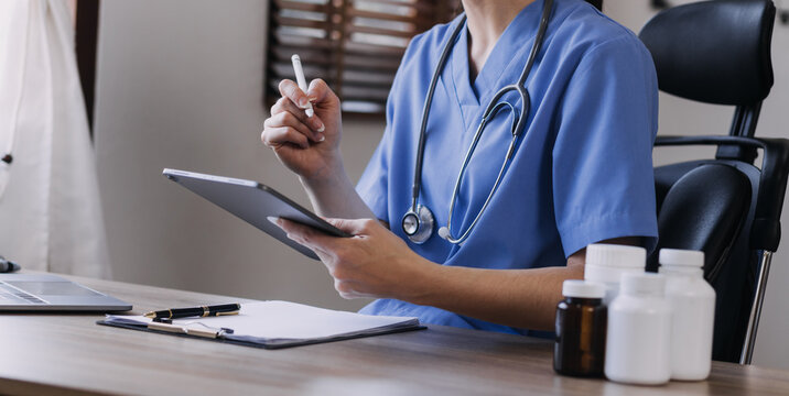 Homecare Nursing Service And Elderly People Cardiology Healthcare. Close Up Of Young Hispanic Female Doctor Nurse Check Mature Caucasian Man Patient Heartbeat Using Stethoscope During Visit