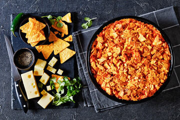 nacho chicken cheese casserole in baking dish