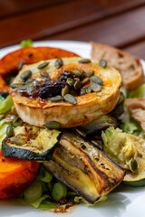 Healthy vegetarian food, Grilled vegetables with goat cheese salad