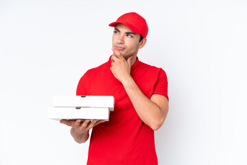 Pizza delivery caucasian man with work uniform picking up pizza boxes isolated on white background...