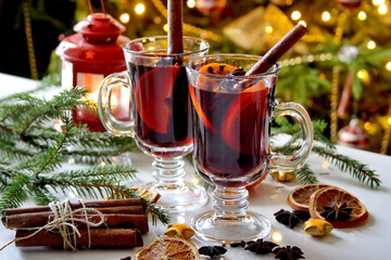 Christmas mulled wine with cinnamon sticks, orange and anise
