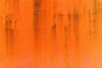 Retro background of orange wall with old paint