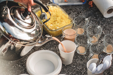 Desi Black Chai in glass mugs with traditional pakistani indian sweet