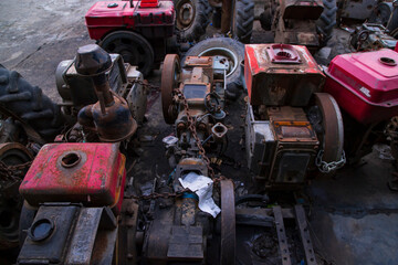 scrapped old power tiller engine on junkyard