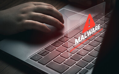 Woman use digital laptop to protect devices from malware alert. Compromised information concept....