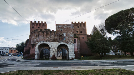 Ancient Rome landmark with majestic well preserved Porta San Paolo gate one of the southern gates of the Aurelian Walls that protected Rome located at Piazzale Ostiense in Rome