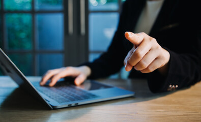 close up hands multitasking man using tablet, laptop and cellphone connecting wifi