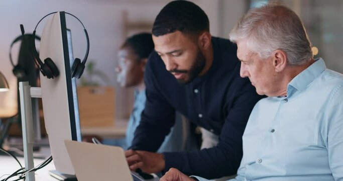 Business, manager help employee and talking with teamwork, office or discussion with a system. Staff, working late or male ceo with a man, documents or conversation with collaboration, tech or mentor