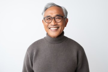 Portrait of Asian senior man wearing eyeglasses on white background