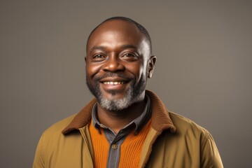Obraz premium Portrait of a happy african american man smiling at camera