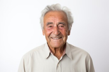 Portrait of a senior man smiling at the camera on white background