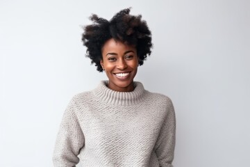 Fototapeta na wymiar Portrait of smiling african american woman in sweater looking at camera.
