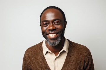 Cheerful african american man smiling and looking at camera
