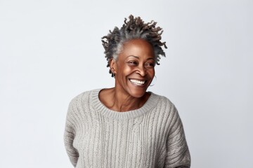 Fototapeta premium Portrait of a happy african american woman smiling at camera