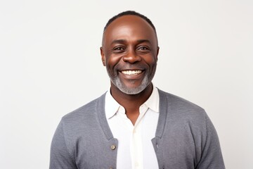 Portrait of a happy african american man smiling over white background