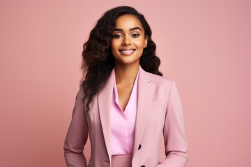 Portrait of beautiful african american businesswoman in pink suit