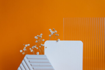 beautiful bright abstract orange background with geometric shapes and flowers