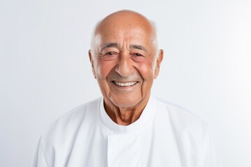 Obraz premium Portrait of a happy senior asian man smiling on white background