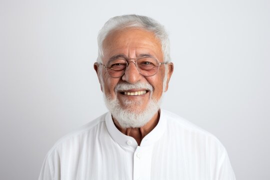 Portrait of happy senior asian man in white shirt and glasses