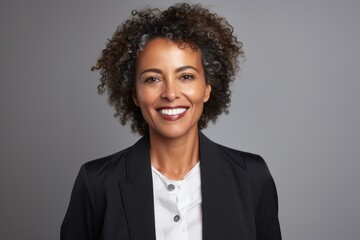 Portrait of a happy african american businesswoman smiling at camera