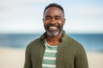 Portrait of a smiling african american man on the beach