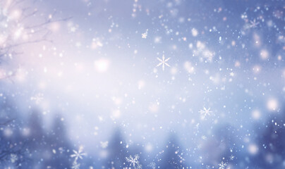 Magical winter background with snow,snowflakes and soft bokeh lights on blue sky,cold backdrop for Christmas. Snowy still life at frosty weather time blurred magical background
