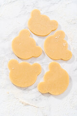 Panda shaped shortbread cookies with chocolate icing