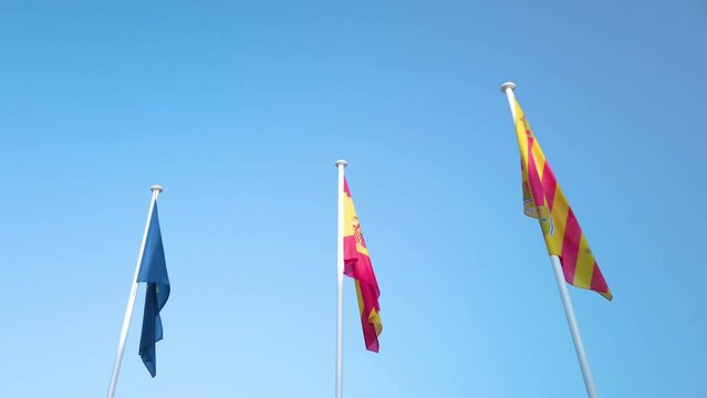 EU flag Spanish flag local Ibiza flag waving
