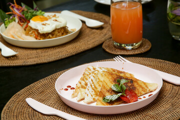 Various healthy and delicious meals served on the restaurant table