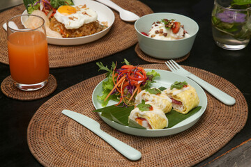 Various healthy and delicious meals served on the restaurant table