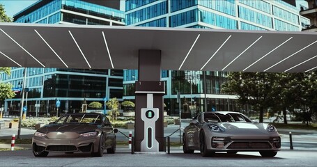 Obraz premium Charge station for electric cars. Electric cars at charging station